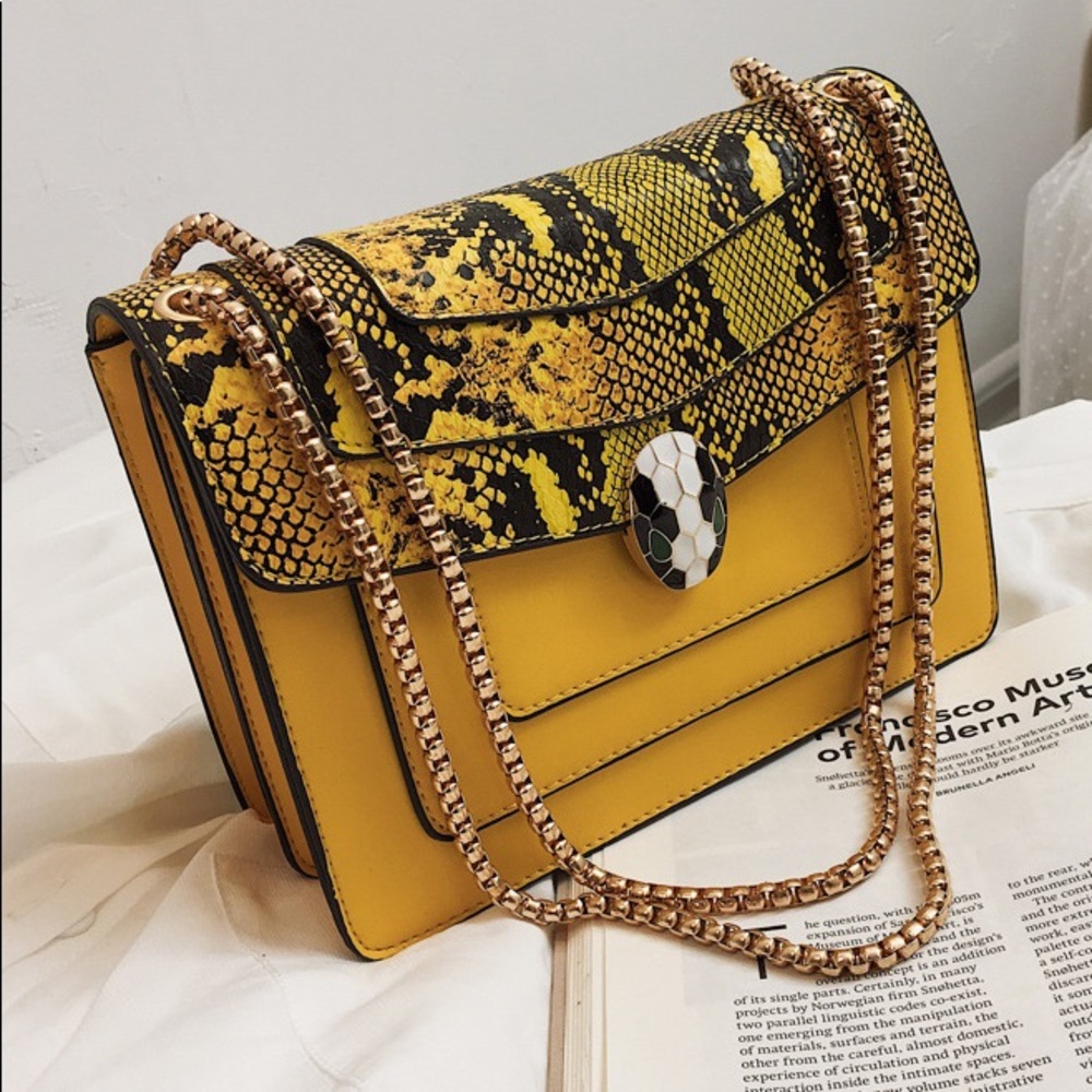 Yellow snake skin handbag